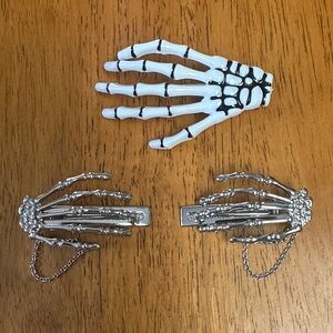 Skeleton Hand Hair Clips, white plastic and metal with chains.